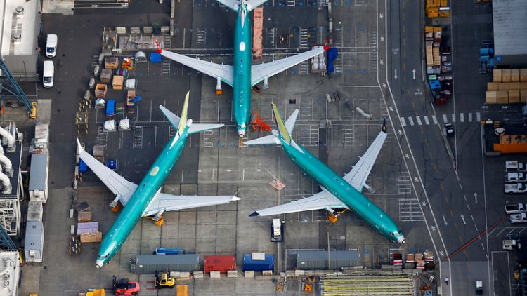 American pulls 737 MAX flights through early December, still sees approval this year