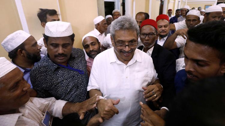 In Sri Lanka, a polarising politician reaches out to minorities but suspicion lingers