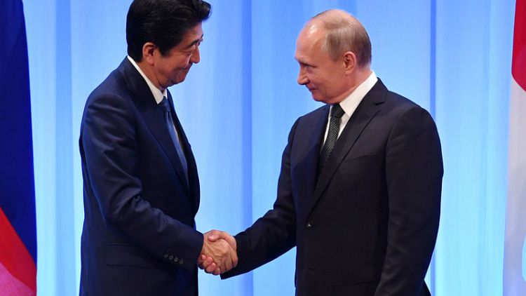 Japan's Abe says he plans to meet with Putin in Russia this week