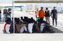 Migrants disembark from German rescue ship seized in Italy