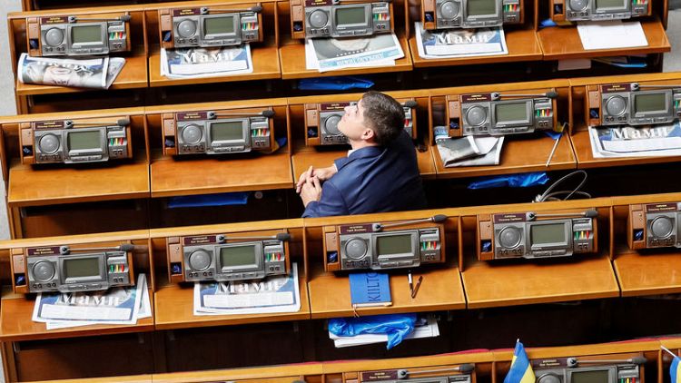 Ukraine parliament votes to strip lawmakers of immunity from prosecution