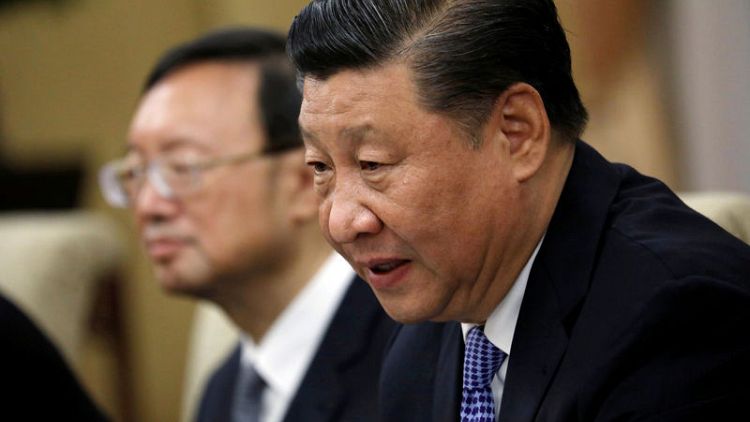 China's Xi says country facing a period of 'concentrated risks'