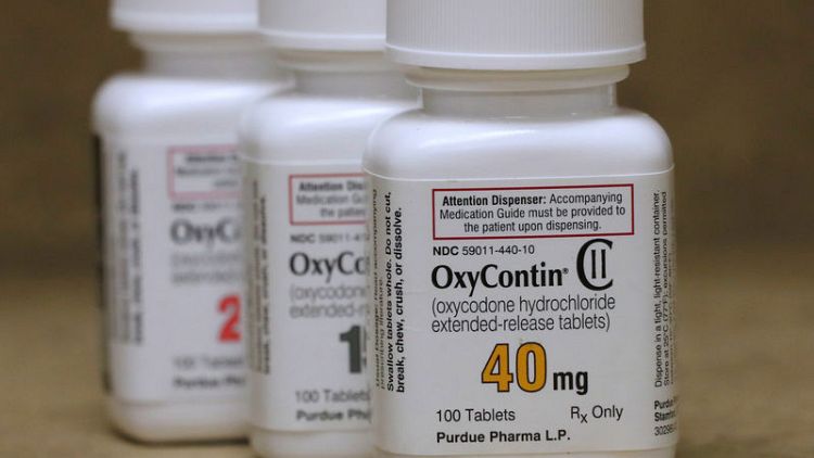 U.S. judge orders big drug companies to face opioid trial