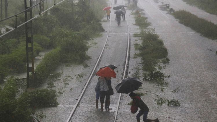Heavy rains cause commuter chaos in India's financial hub