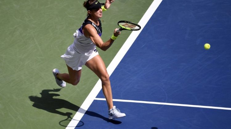 Bencic goes back to the future to reach U.S. Open semis