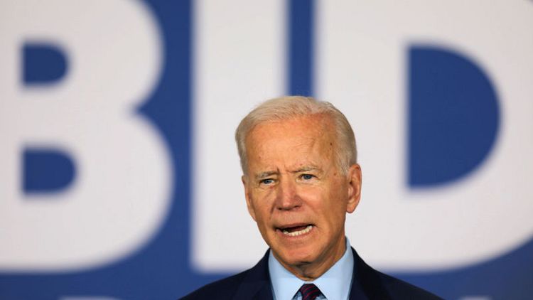 Biden jokes about gaffes with Colbert, gets serious about climate on CNN