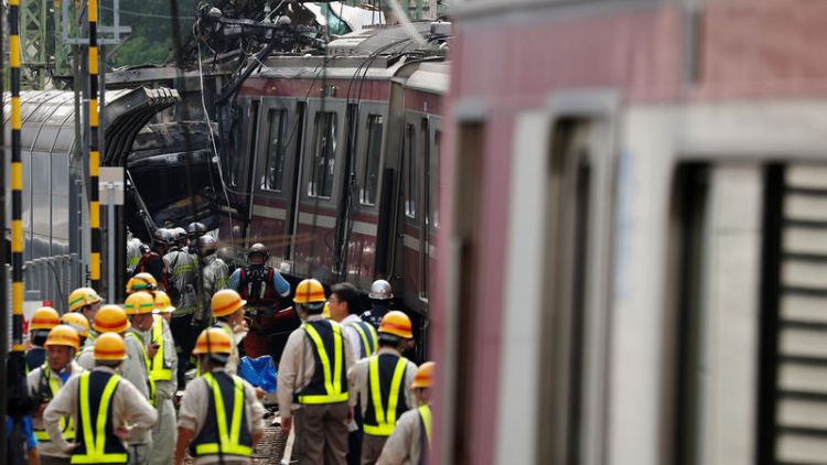 At least 34 injured, one critically, as truck and train collide in Japan