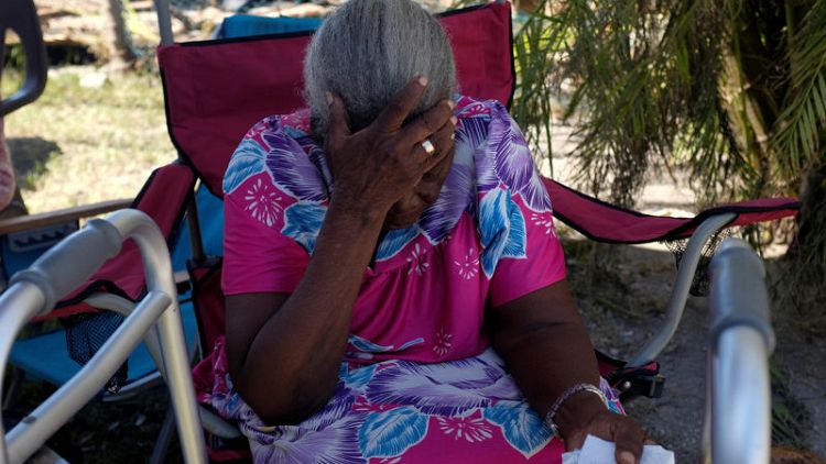 Bahamas hurricane survivors tell of children swept away; death toll reaches 30