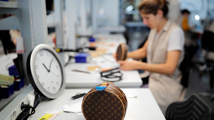 Vuitton to hire more French handbag makers as Chinese sales boom