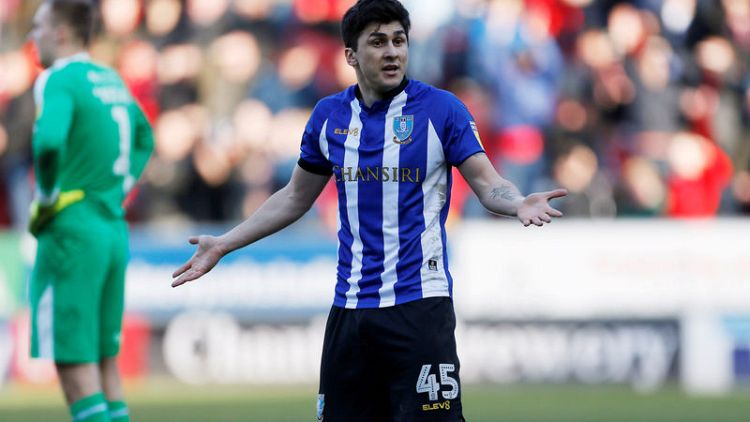 Soccer-Sheffield Wednesday's Forestieri banned after losing racism appeal