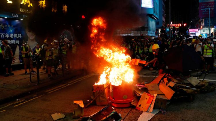 Hong Kong police break up protests as summer of discontent shows no sign of let-up