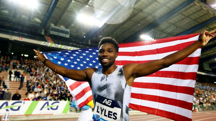 Lyles completes sprint double before world championships