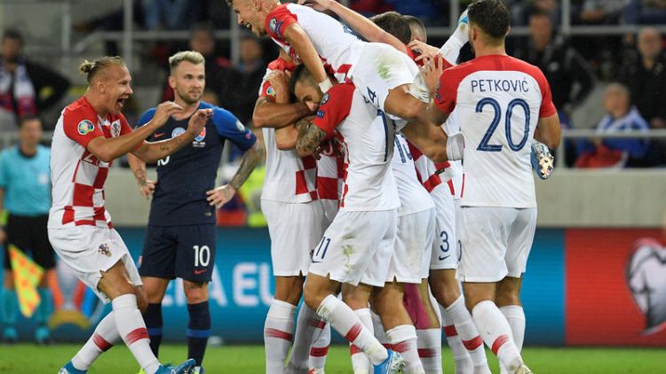 Croatia ease past Slovakia as Wales edge Azerbaijan