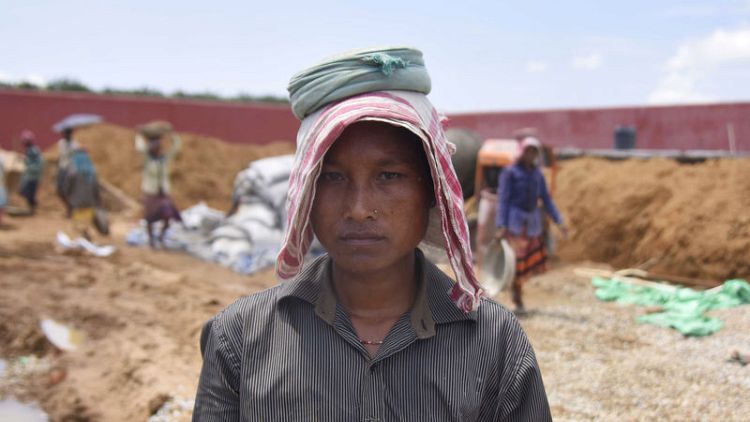 As they build India's first camp for illegals, some workers fear detention there