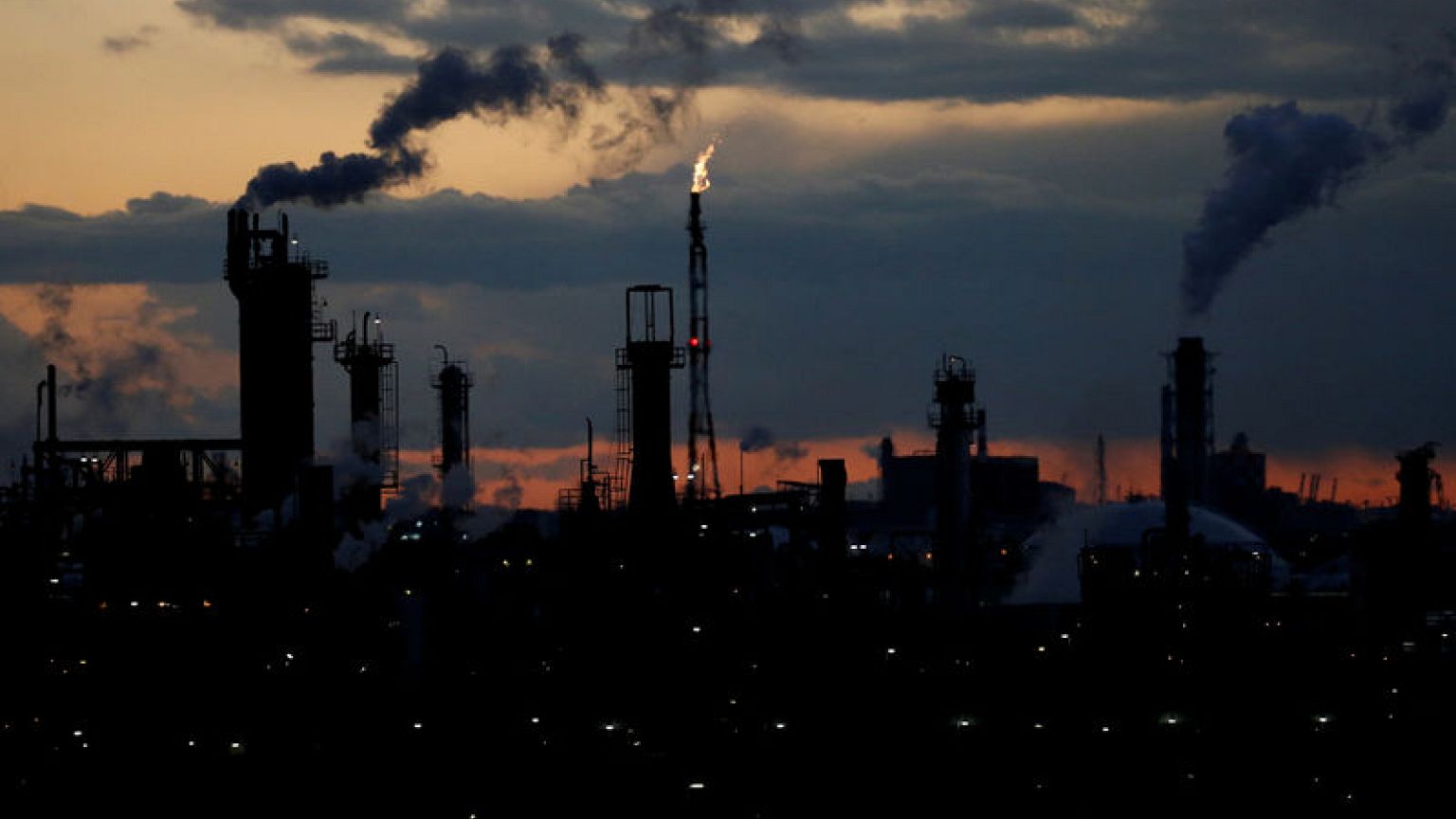 Japan downgrades second quarter GDP as trade war dulls business investment