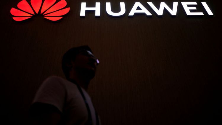 U.S. charges Chinese professor in latest shot at Huawei