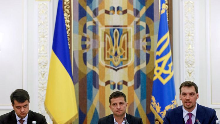 Ukraine ruling party gets impeachment law through parliament