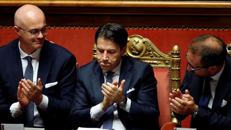 Italian coalition wins vote in Senate letting it take office