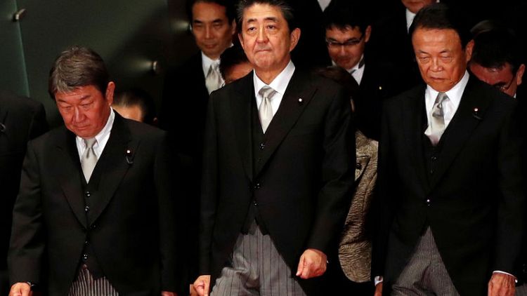 Japan's Abe drafts rising star MP, allies for new cabinet, eyes constitution reform