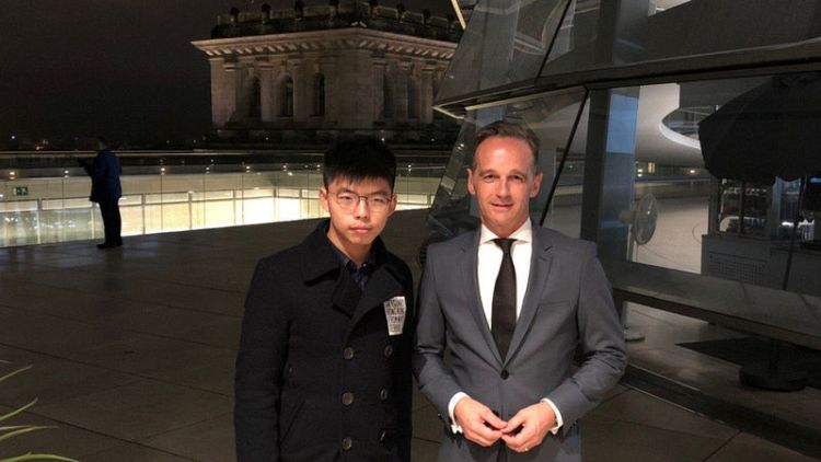 China envoy raps Germany over meeting with Hong Kong activist