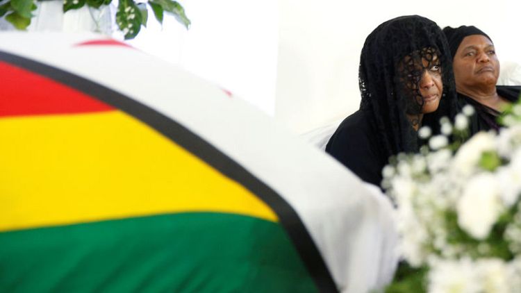 Mugabe's family says burial to be private, in snub to successor