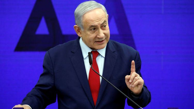 With Gaza war talk, Russia visit, Netanyahu fights on in election race