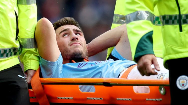 Injured Man City defender Laporte out for up to six months