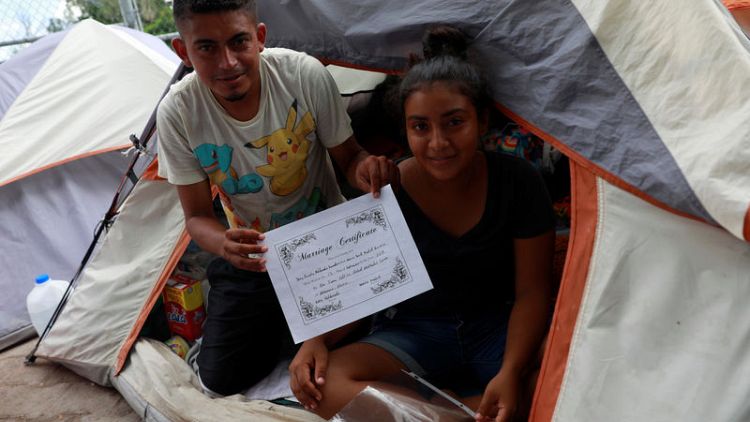 After U.S. court ruling, Honduran newlyweds among migrants clinging to asylum dream