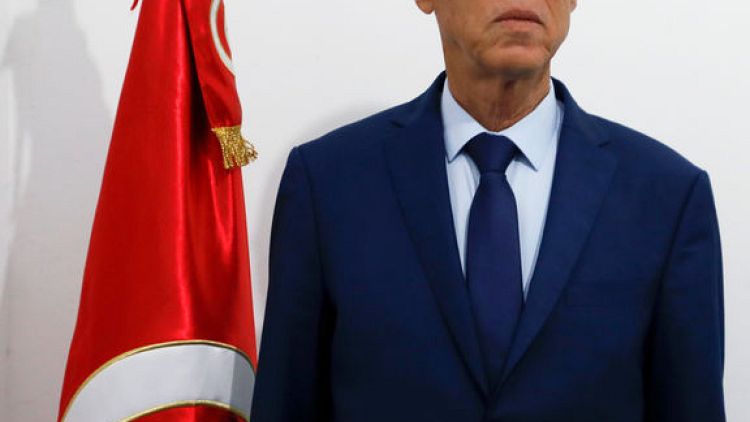 Tunisian establishment reels as outsiders claim election win