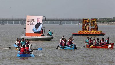 Giant cake, news of Bollywood film mark Modi's birthday celebrations Giant cake, news of Bollywood film mark Modi's birthday celebrations