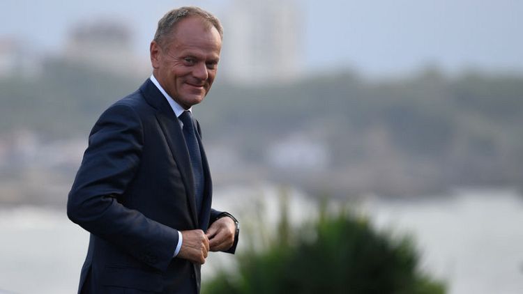 EU's Tusk urges bloc to back talks with Balkan neighbours