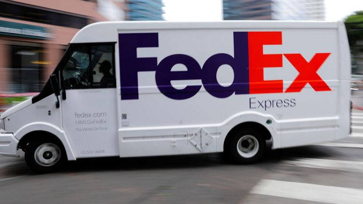FedEx quarterly profit falls 14%