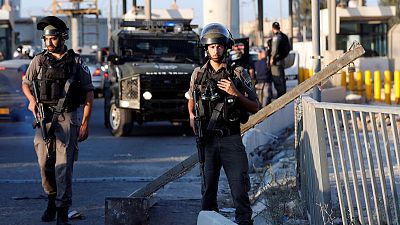Israeli troopers shoot Palestinian woman, say she tried to stab them