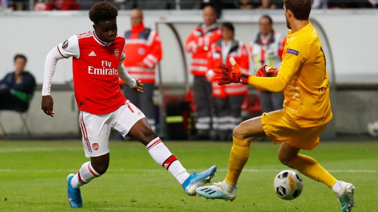 Teenager Saka scores as Arsenal win at Frankfurt in Europa League