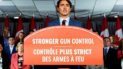 Canada's Trudeau pledges assault rifle ban, pivots campaign amid blackface scandal