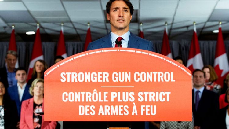 Canada's Trudeau pledges assault rifle ban, pivots campaign amid blackface scandal