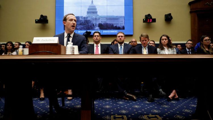 Few U.S. lawmakers hit 'like' button after Facebook CEO visits Capitol Hill