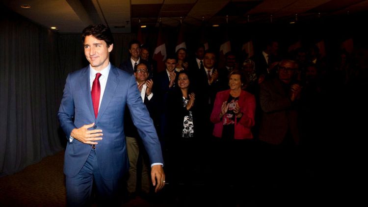 Canada's Trudeau resumes campaign as polls show damage from blackface photo