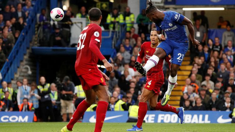Leaders Liverpool stay perfect with 2-1 win at Chelsea