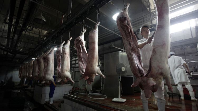C.P. plans bigger, cleaner pig farms after disease devastates Chinese herd
