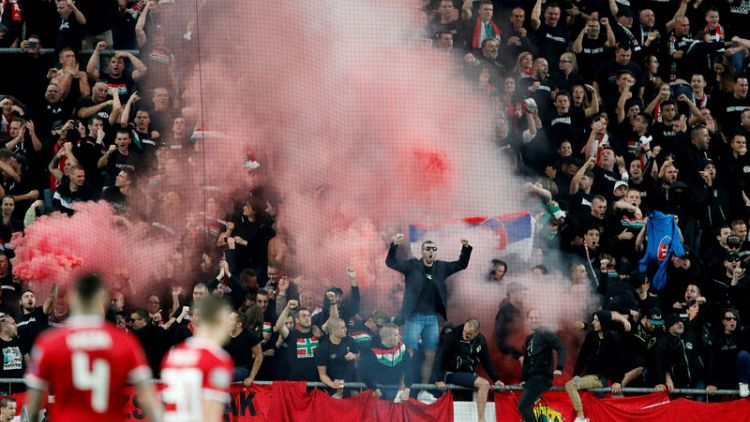 Hungary, Slovakia get stadium bans for fans' racist behaviour