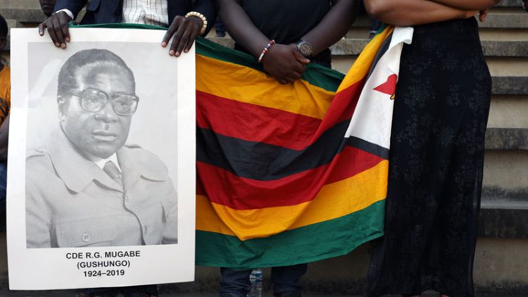 Zimbabwe's Mugabe died from cancer, president says