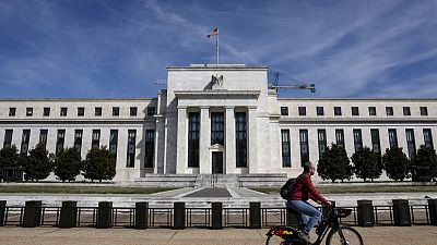 U.S. Fed policymakers say lower rates are helping