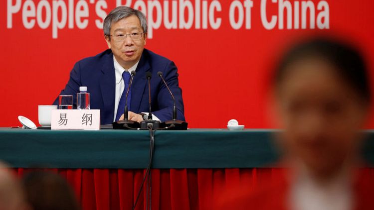 China's central bank says in no rush to ease aggressively