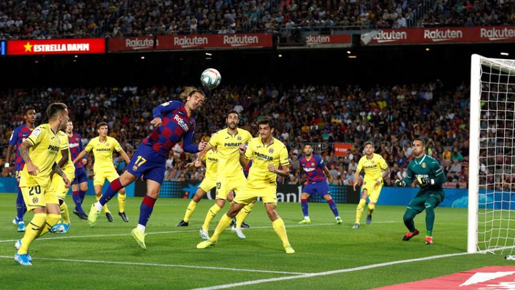 Barca secure win over Villarreal as Messi limps off