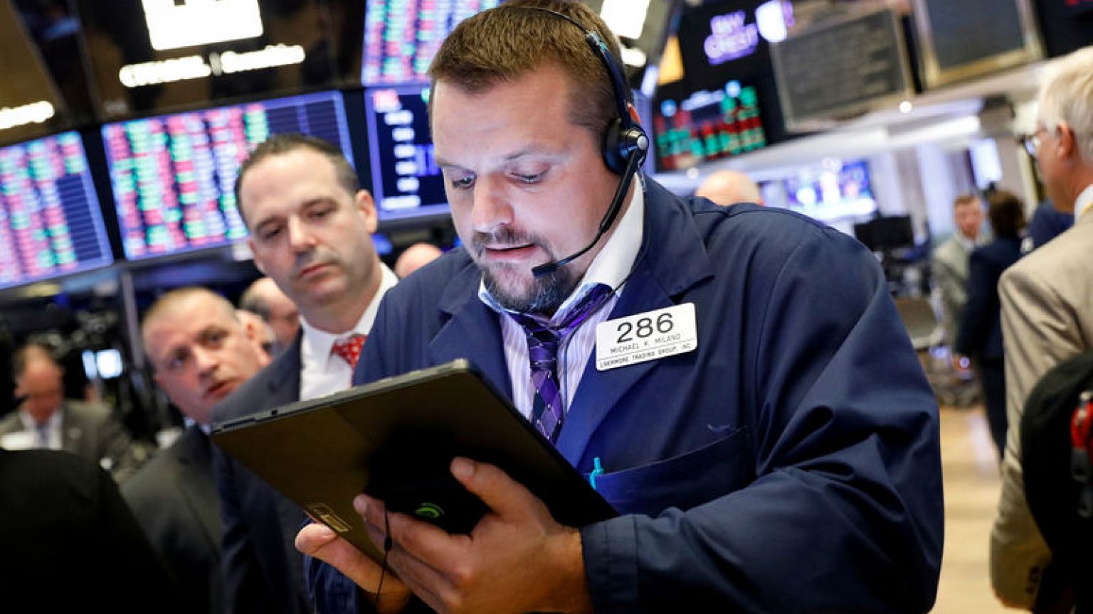 U.S. bucks broader equity weakness on trade hopes, dollar gains