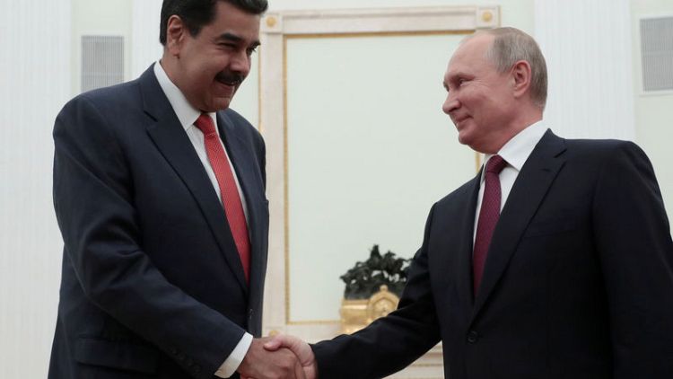 Putin to Maduro: Russia backs talks between Venezuela's government, opposition