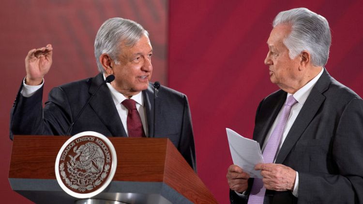 Mexican president defends utility head against charges of corruption