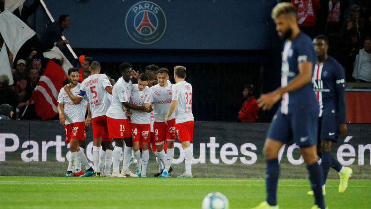 PSG suffer rare home defeat against Reims