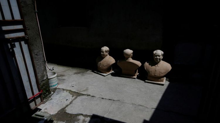 Busts of leaders a hit in China's porcelain capital ahead of key anniversary